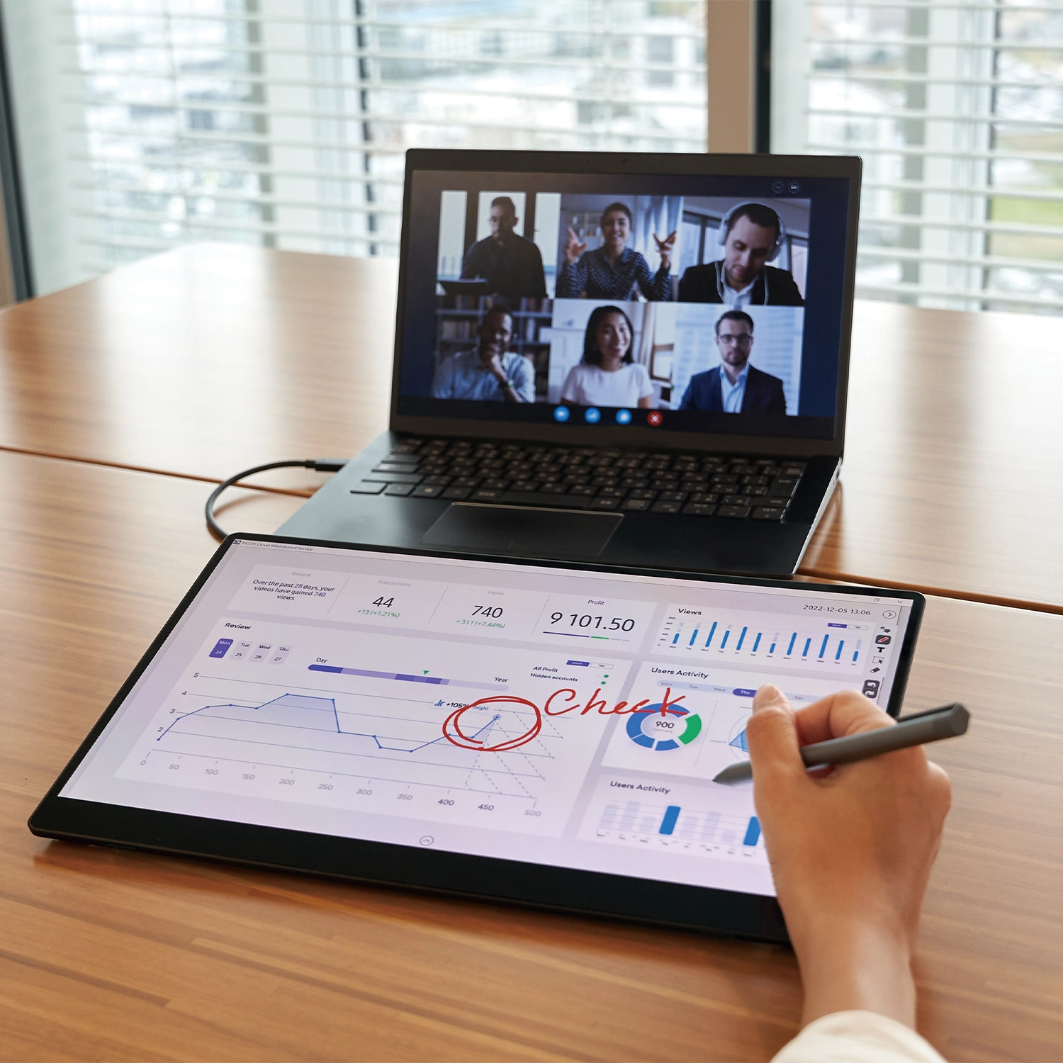 RICOH monitor with stylus being used in a virtual meeting 